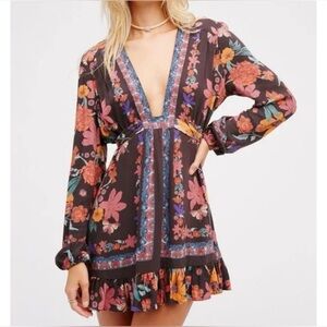 Free people floral tunic top. Size 4